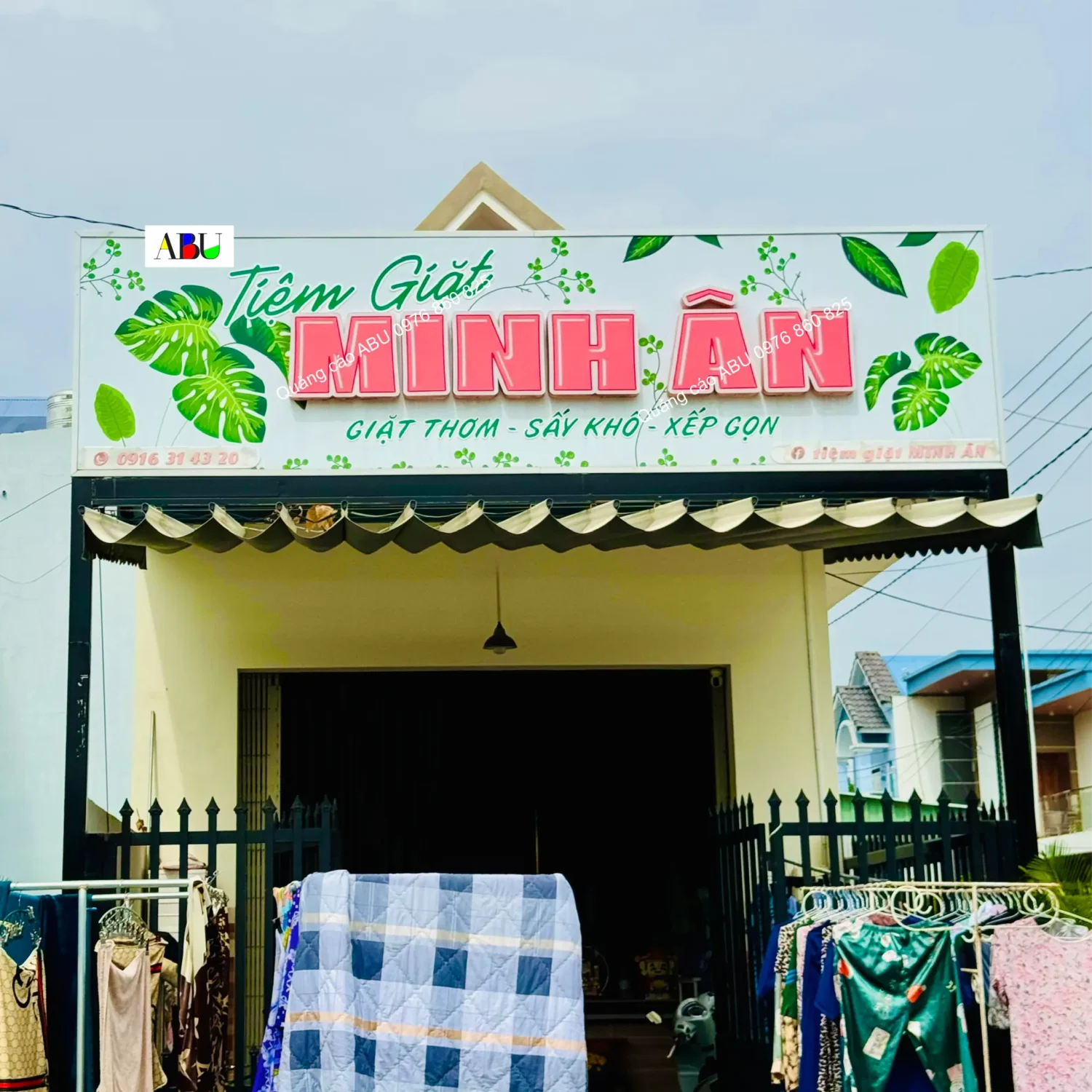 Bảng hiệu tiệm giặt Minh Ân