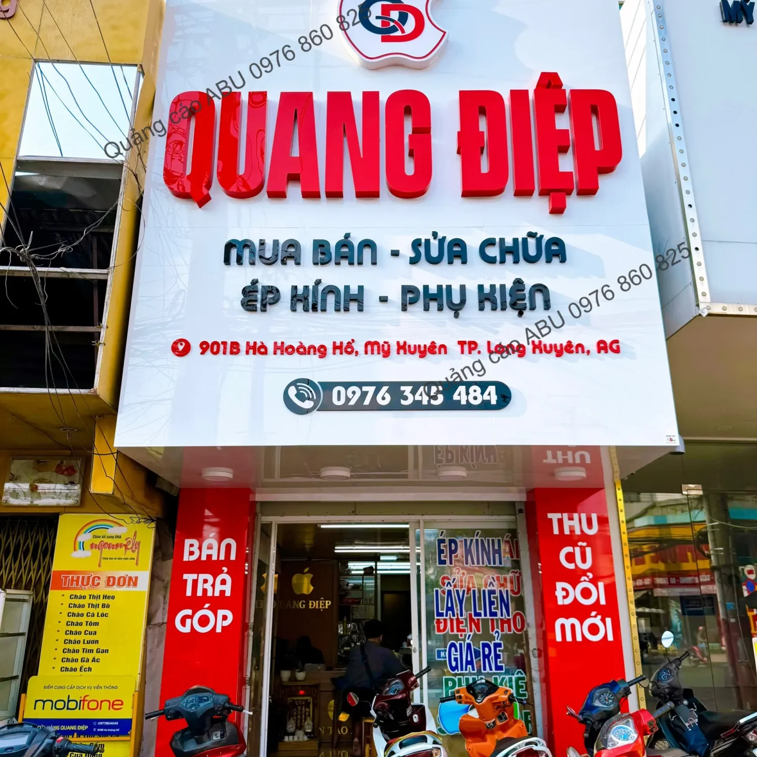 Bàn giao mặt tiền cửa hàng điện thoại QUANG ĐIỆP