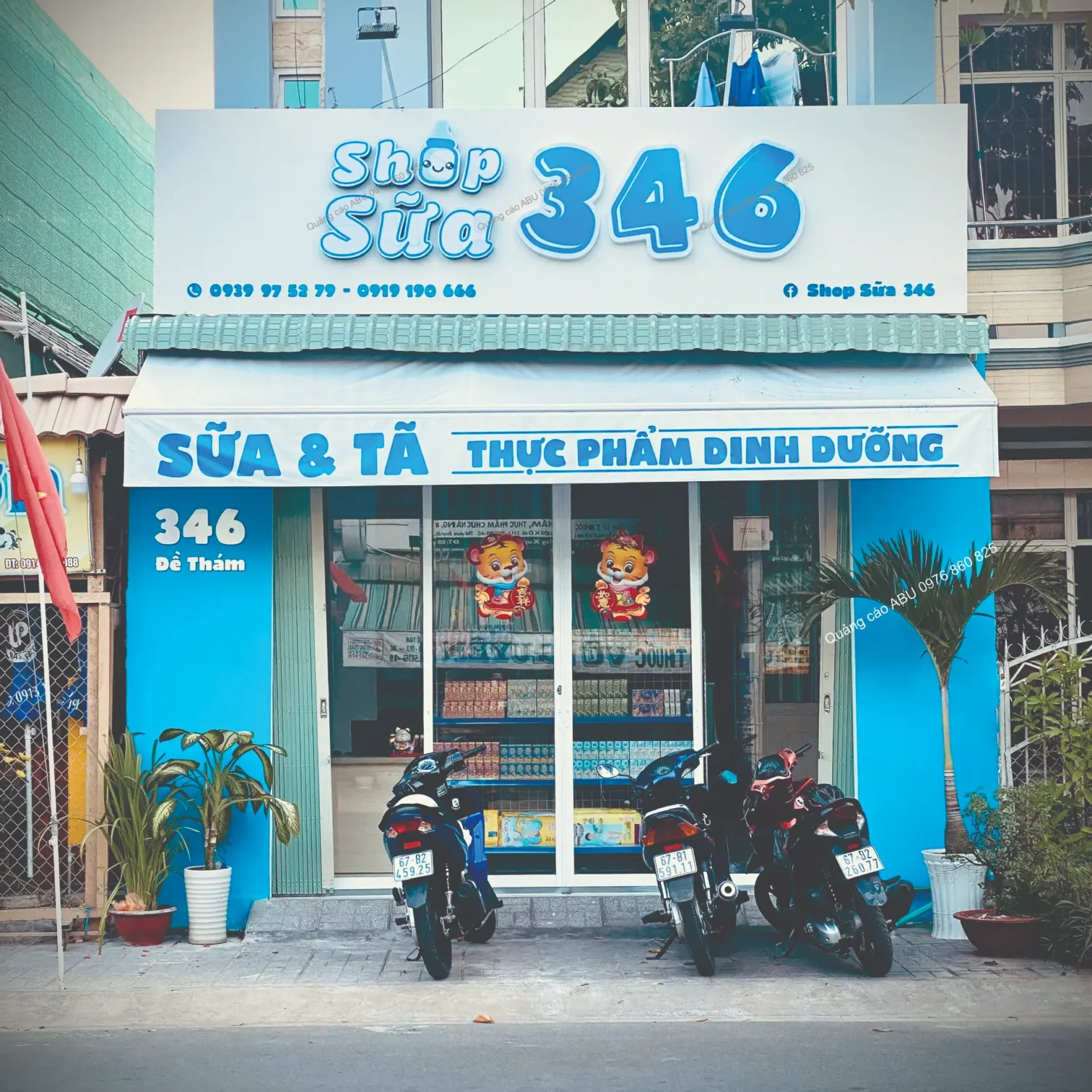 Bàn giao mặt tiền cửa hàng Shop Sữa 346