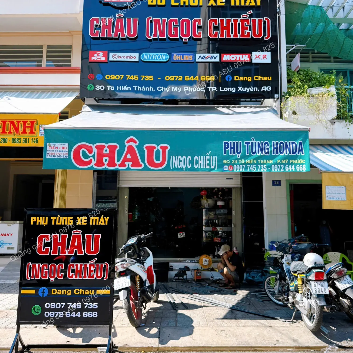 Bảng hiệu cửa hàng phụ tùng đồ chơi xe máy Châu Ngọc Chiếu